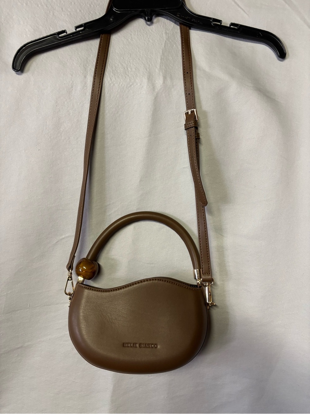 Melie Bianco Brown Mini Crescent Crossbody with Amber Accent